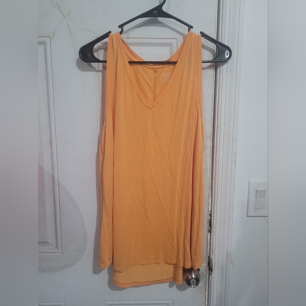 3 tops orange teal and black